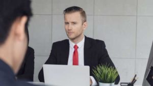 An employee working from a computer.