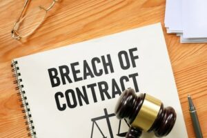 Breach of contract shown using text and court gavel