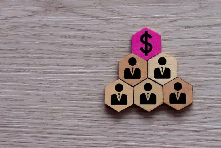 Blocks with icons of people in suits represent minority shareholder rights beneath a block with a dollar sign.